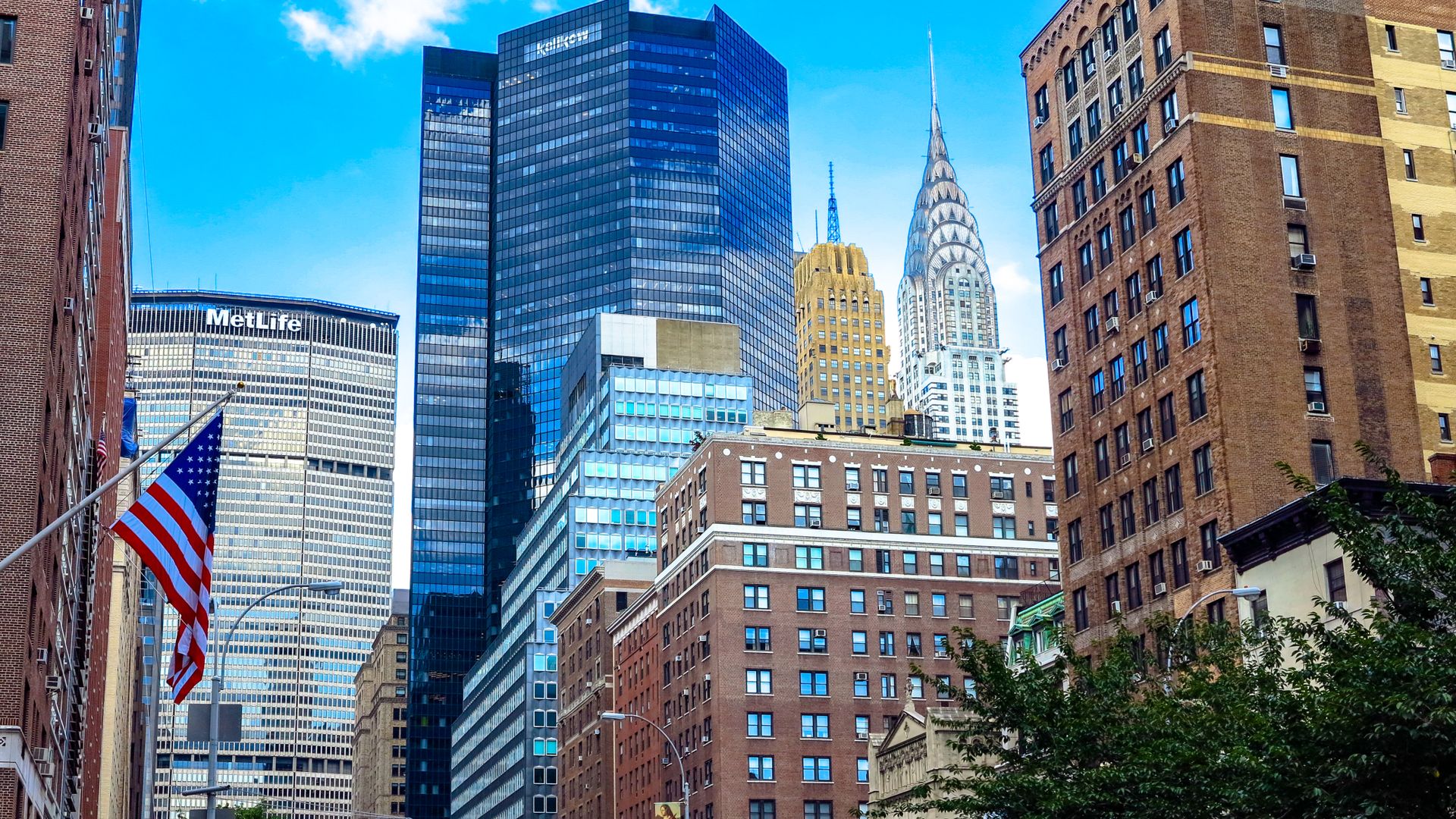 Midtown Manhattan apartment buildings, representative of the co-op and condo capital-improvement renovations Perennial Empire runs across New York City.